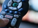 With tough competition from fellow streaming services, Netflix is dedicated to cracking down on password sharing amongst its users (Photo by CHRIS DELMAS/AFP via Getty Images)
