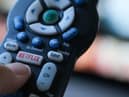 With tough competition from fellow streaming services, Netflix is dedicated to cracking down on password sharing amongst its users (Photo by CHRIS DELMAS/AFP via Getty Images)