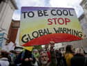 Scientists and science enthusiasts gather prior to the start of the 'March for Science' which celebrates the scientific method outside the Science Museum in central London on April 22, 2017, Earth Day