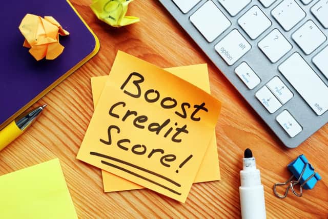 Boost your credit score mark (photo: Adobe)