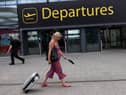 Travellers at Gatwick Airport on July 30, 2021 in London, England. (Photo by Dan Kitwood/Getty Images)