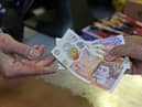 The first instalment of the £900 cost of living payments is set to land in bank accounts today. The £301 cash boost from the Department for Work and Pensions (DWP) and HMRC will be paid to those who are eligible over the next few weeks from Tuesday, April 25.