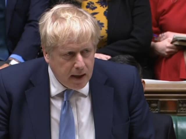 Prime Minister Boris Johnson delivers a statement to MPs in the House of Commons on the Sue Gray report (PA)