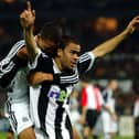 Kieron Dyer (right) of Newcastle celebrates after team mate, Hugo Miguel Viana, scores a goal during the UEFA Champions League First Phase Group E match between Feyenoord and Newcastle United on November 13, 2002 played at the De Kuip Stadium in Rotterdam, Holland. Newcastle United won the match 3-2. (Photo by Stu Forster/Getty Images) 