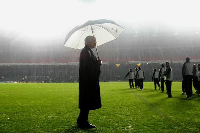 Newcastle manager Sir Bobby Robson looks on during the pitch inspection before the game is postponed during the match between Barcelona and Newcastle United in the UEFA Champions League, Second Phase, Group A match at the Nou Camp in Barcelona, Spain on December 10, 2002. Robson has been sacked by Newcastle August 30, 2004 following a poor start to the new season. (Photo By Laurence Griffiths/Getty Images)