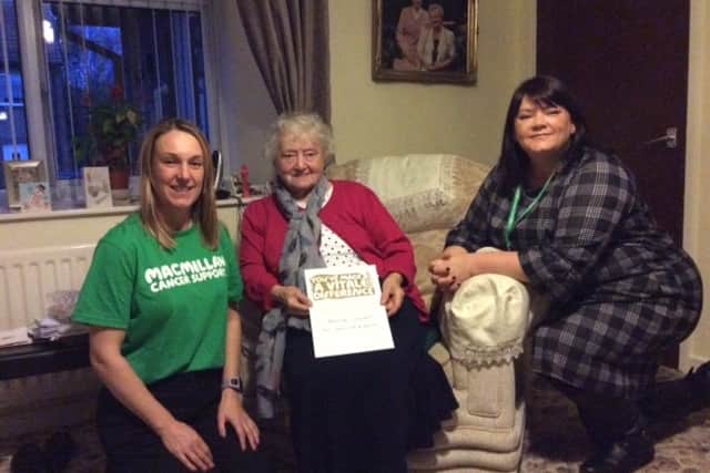 Maisie with Jane Curry, fundraising manager for Macmillan and Tina Thompson Partnership Manager for Macmillan.