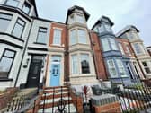 This terraced property features a small front garden area that has space for a table and chairs