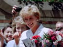 Diana, Princess of Wales, smiles as she meets wellwishers outside St Vincent's Hospice in Sydney on November 2, 1996, her last official engagement in Australia.