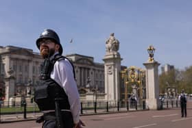 A Met Police officer outside Buckingham Palace, ahead of the Coronation. (Photo by Dan Kitwood/Getty Images)