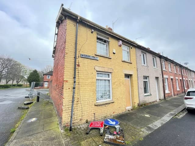 The front of the property shows off the end terraced house