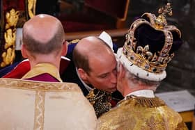  Prince William kisses his father, Britain’s King Charles III as he pays homage (Photo: Getty Images)