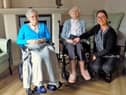 Peggy, 100 and Marjorie, 102 with Sycamore Care Centre manager, Amy.