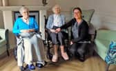 Peggy, 100 and Marjorie, 102 with Sycamore Care Centre manager, Amy.
