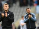 Eddie Howe applauds Newcastle United fans after the Arsenal game.