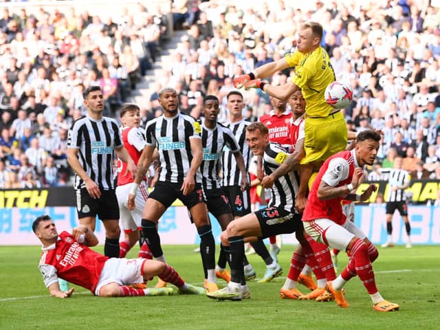 Aaron Ramsdale of Arsenal attempts to make save during the Premier League match between Newcastle United and Arsenal FC at St. James Park on May 07, 2023 in Newcastle upon Tyne, England. 