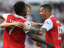 Arsenal captain Martin Odegaard celebrates scoring v Newcastle United with Bukayo Saka and Jakub Kiwior 
