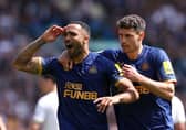 Newcastle United No.9 Callum Wilson celebrates his goal with Fabian Schar.