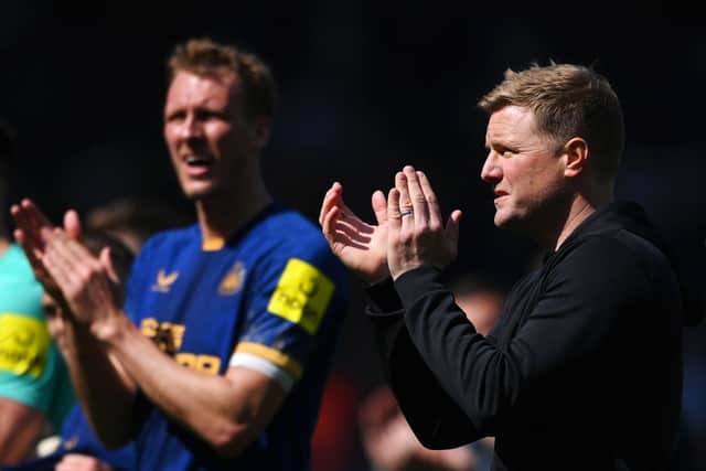 Eddie Howe applauds Newcastle United fans at Elland Road.