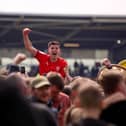 Newcastle United defender Kelland Watts celebrates promotion with Wigan Athletic last season.