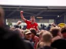 Newcastle United defender Kelland Watts celebrates promotion with Wigan Athletic last season.
