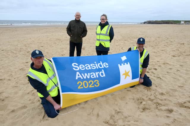 Cllr Ernest Gibson is pictured with Danny George, Kate Fairley and John Durham from the Council’s beach maintenance team. 