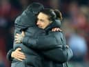 Liverpool boss Jurgen Klopp hugs Uruguayan forward Darwin Nunez.  (Photo by LINDSEY PARNABY/AFP via Getty Images)