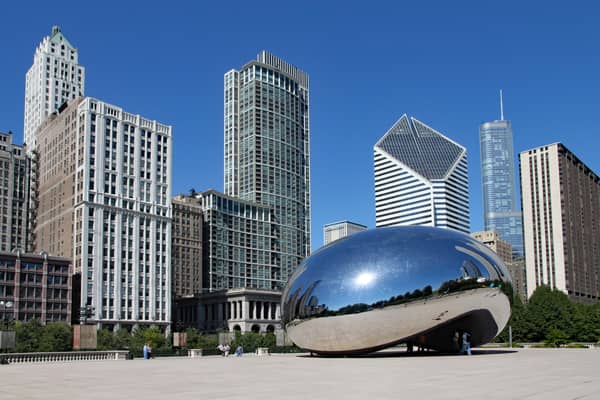 The Cloud Gate sculpture, popularly known as the bean, with Chicago's skyline