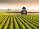 A toddler died after being hit by a tractor in Devon