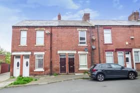 The front of the property shows off the first floor flat and available parking