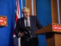 Boris Johnson to stick with ‘Plan B’ Covid measures despite mounting pressures (Photo by JACK HILL/POOL/AFP via Getty Images)
