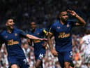 Callum Wilson of Newcastle celebraters with Miguel Almiron after scoring the second Newcastle goal from the penalty spot during the Premier League match between Leeds United and Newcastle United at Elland Road on May 13, 2023 in Leeds, England. (Photo by Stu Forster/Getty Images)