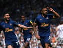 Callum Wilson of Newcastle celebraters with Miguel Almiron after scoring the second Newcastle goal from the penalty spot during the Premier League match between Leeds United and Newcastle United at Elland Road on May 13, 2023 in Leeds, England. (Photo by Stu Forster/Getty Images)