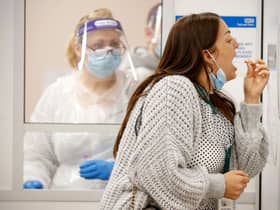 The UK public is being warned that the rapidly spreading Omicron variant posed a "serious threat" as the county records its highest ever daily case total.  (Credit:Getty Images)