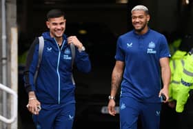 Newcastle United pair Bruno Guimaraes and Joelinton arrive at St James' Park.
