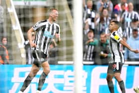 Dan Burn celebrates his goal.