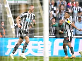 Dan Burn celebrates his goal.