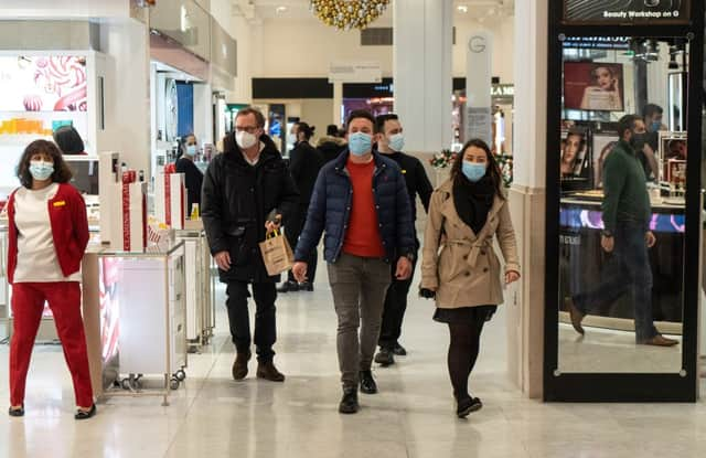 Face masks will be compulsory in shops and on public transport in England from Tuesday (29 November) (Photo: Getty Images)