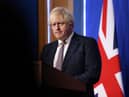 Prime Minister Boris Johnson speaks during a press conference after cases of the new Covid-19 variant were confirmed in the United Kingdom on November 27, 2021 in London, England. UK authorities confirmed today that two cases of the new Omicron Covid-19 variant, which had prompted a flurry of travel bans affecting several countries in Southern Africa, were found in the UK. (Photo by Hollie Adams/Getty Images)