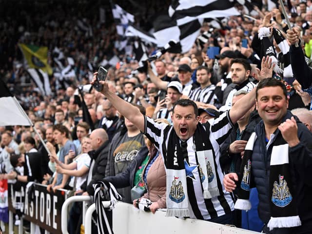 Newcastle United's supporters cheer during the English Premier League football match between Newcastle United and Brighton and Hove Albion at St James' Park in Newcastle-upon-Tyne, north east England on May 18, 2023. (Photo  (Photo by OLI SCARFF/AFP via Getty Images)