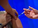 Three-quarters of adults in the UK have received both doses of a Covid-19 vaccine (Photo by JUSTIN TALLIS/AFP via Getty Images)