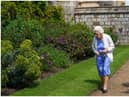 Queen Elizabeth II views a border in the gardens of Windsor Castle, where she received a Duke of Edinburgh rose, given to her by the Royal Horticultural Society (Photo by Steve Parsons - WPA Pool/Getty Images)