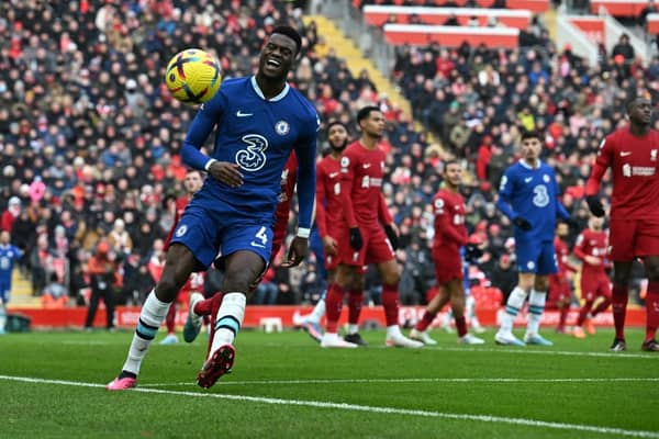 Chelsea's French defender Benoit Badiashile eyes the ball during the English Premier League football match (Photo by PAUL ELLIS/AFP via Getty Images)