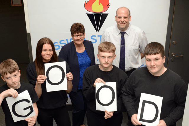 The Beacon Centre’s headteacher Dominick Gray, with lead member Cllr Jane Carter and pupils at the school. 