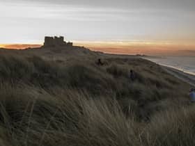 The sun sets behind Bamburgh Castle (Photo: Dan Kitwood/Getty Images)