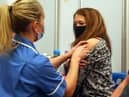 Around half a million 44-year-olds will receive a text inviting them to get their jab through the national booking service, NHS England said (Photo by Steve Parsons - WPA Pool/Getty Images)