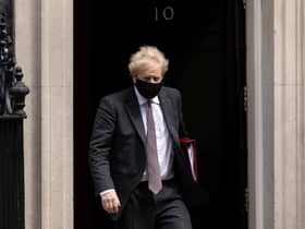 Prime Minister Boris Johnson leaves 10 Downing Street to attend the weekly Prime Ministers Questions in Parliament on April 21 (Photo by Dan Kitwood/Getty Images)