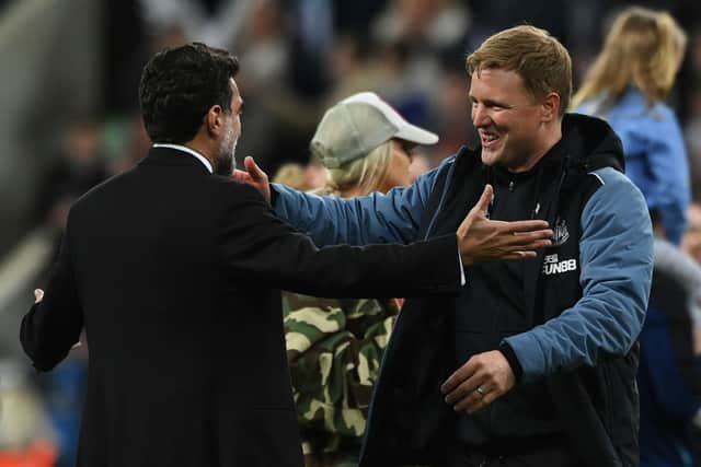 Newcastle United chairman Yasir Al-Rumayyan greets head coach Eddie Howe after the Leicester City game.