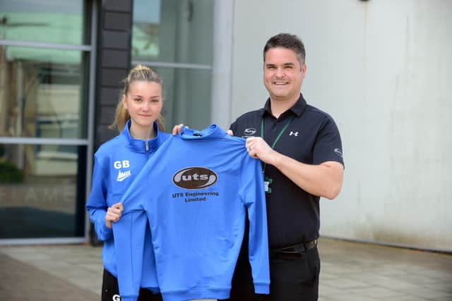St. Joseph's RC Hebburn Girls U15s have reached ESFA National Cup Final and the club is getting tracksuits sponsored by UTS. UTS Neil Rowling with team captain Grace Bell, 15.