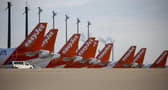 Easyjet planes are seen parked at the "Berlin Brandenburg Airport Willy Brandt" in Schoenefeld, southeast of Berlin (Photo by ODD ANDERSEN/AFP via Getty Images)
