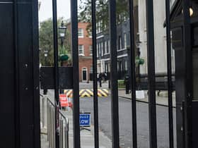A car has crashed into the gates leading to the British government buildings on Downing Street 